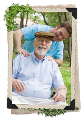 A youg, brunette caregiver helps an older man with a brown hat.